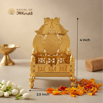 Decorative gold metal Singhasan with measurements on a neutral background, featuring 'House of Aakrutii' branding.